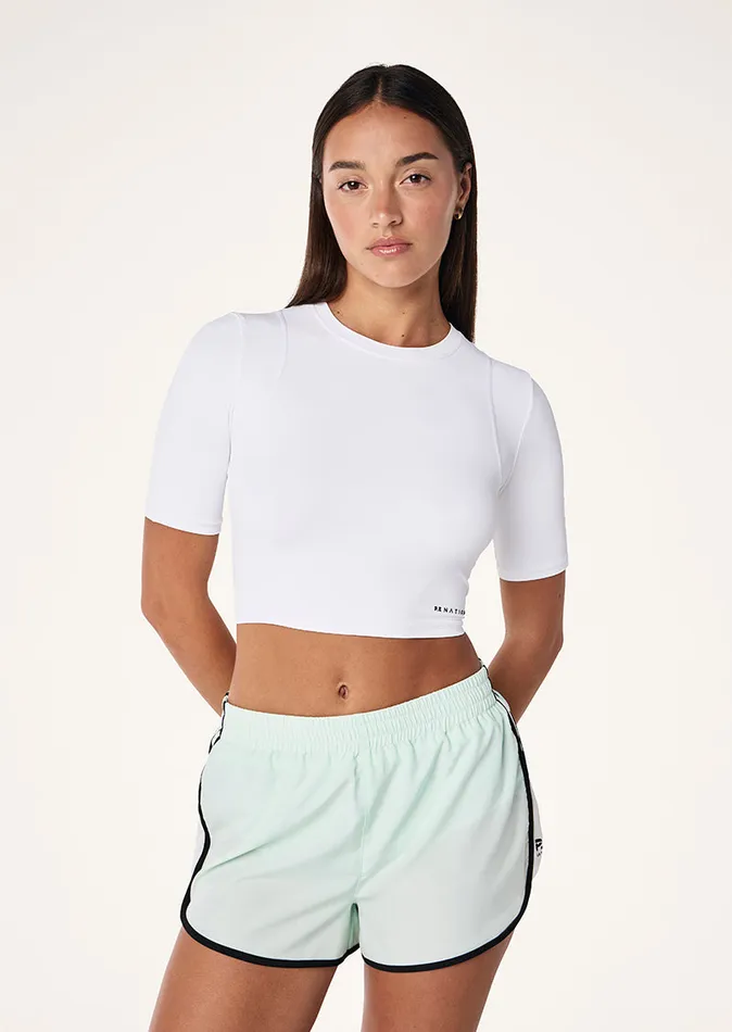 ActiveLite ELEMENTAL CROP TEE IN OPTIC WHITE PE Nation Women