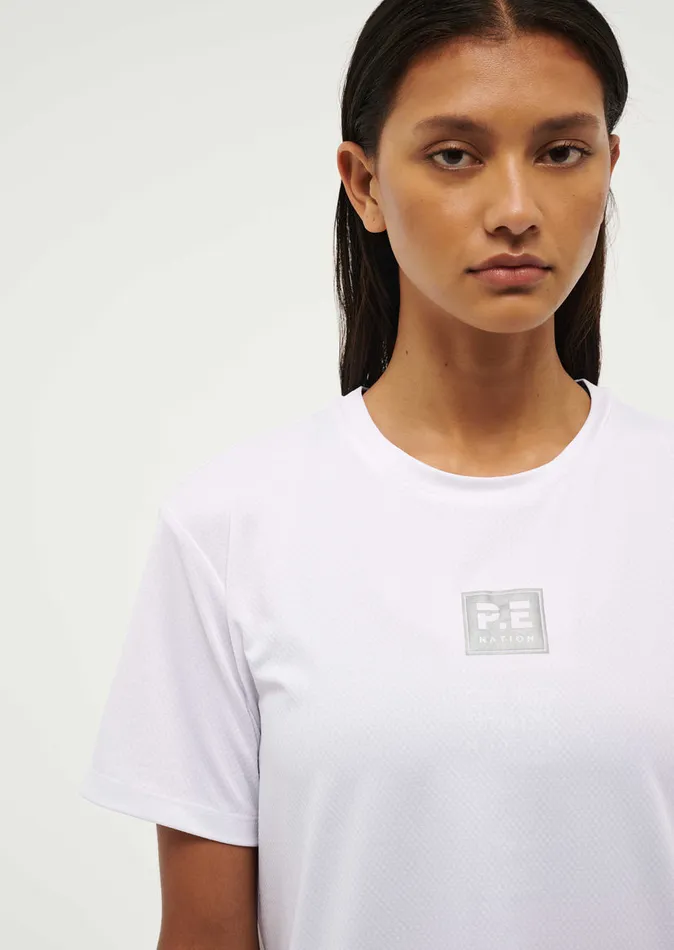 Baseline PE Nation Women CROSSOVER TEE IN OPTIC WHITE