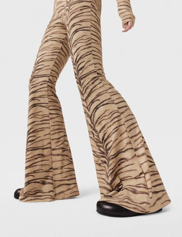 Stella McCartney Pants And Shorts Women Tiger Print HighRise Flared Pants Natural Tiger Print Stella McCartney Pants And Shorts Women Tiger Print HighRise Flared Pants Natural Tiger Print