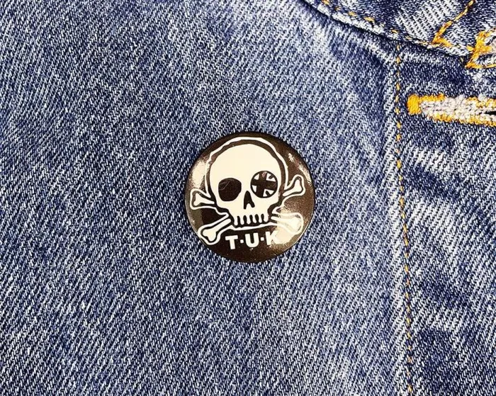 TUK Shoes Stickers Pins Patches Totes Adult Black and White Skull Logo Pin