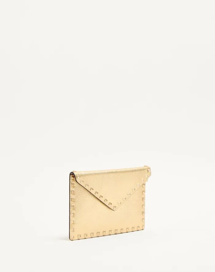 Valentino Clutches Woman Rockstud Laminated Grainy Calfskin Clutch Bag For Woman In Antique Brass Antique Brass Valentino Clutches Woman Rockstud Laminated Grainy Calfskin Clutch Bag For Woman In Antique Brass Antique Brass