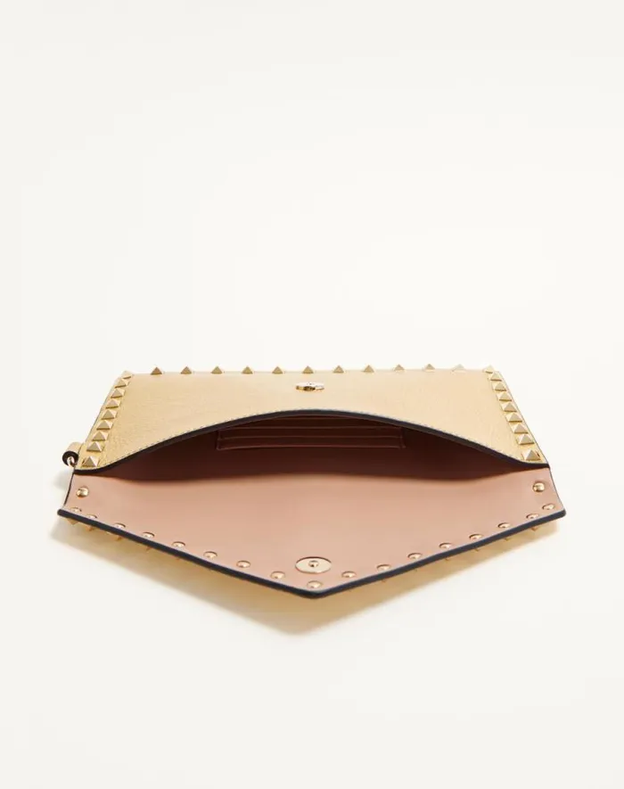 Valentino Clutches Woman Rockstud Laminated Grainy Calfskin Clutch Bag For Woman In Antique Brass Antique Brass Valentino Clutches Woman Rockstud Laminated Grainy Calfskin Clutch Bag For Woman In Antique Brass Antique Brass