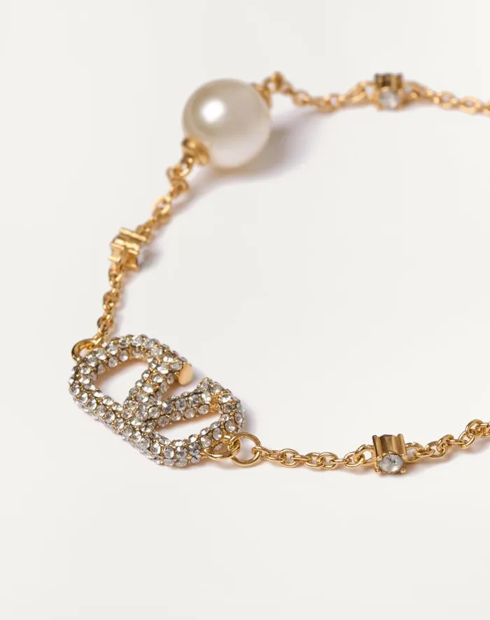 Valentino Jewelry Woman Vlogo Signature Bracelet In Metal Swarovski Crystals And Pearls For Woman In Gold Gold Valentino Jewelry Woman Vlogo Signature Bracelet In Metal Swarovski Crystals And Pearls For Woman In Gold Gold