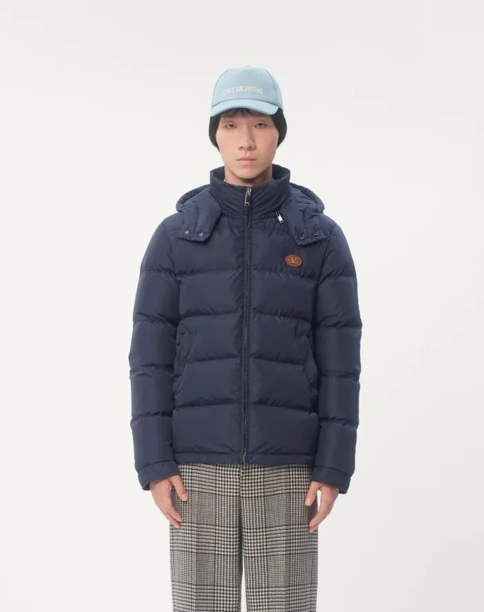 Valentino Outerwear Man Nylon Hooded Down Jacket With Vlogo Patch For Man In Blue Blue Valentino Outerwear Man Nylon Hooded Down Jacket With Vlogo Patch For Man In Blue Blue