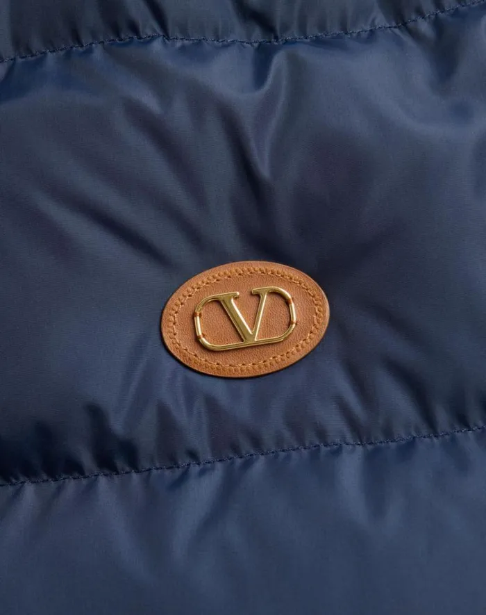 Valentino Outerwear Man Nylon Hooded Down Jacket With Vlogo Patch For Man In Blue Blue Valentino Outerwear Man Nylon Hooded Down Jacket With Vlogo Patch For Man In Blue Blue