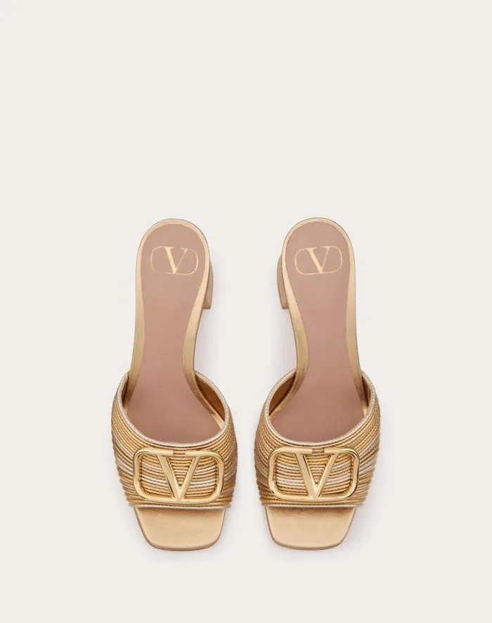Valentino Sandals Woman Metallic Vlogo Signature Slide Sandal With Cornely Embroidery 60mm For Woman In Gold Gold Valentino Sandals Woman Metallic Vlogo Signature Slide Sandal With Cornely Embroidery 60mm For Woman In Gold Gold