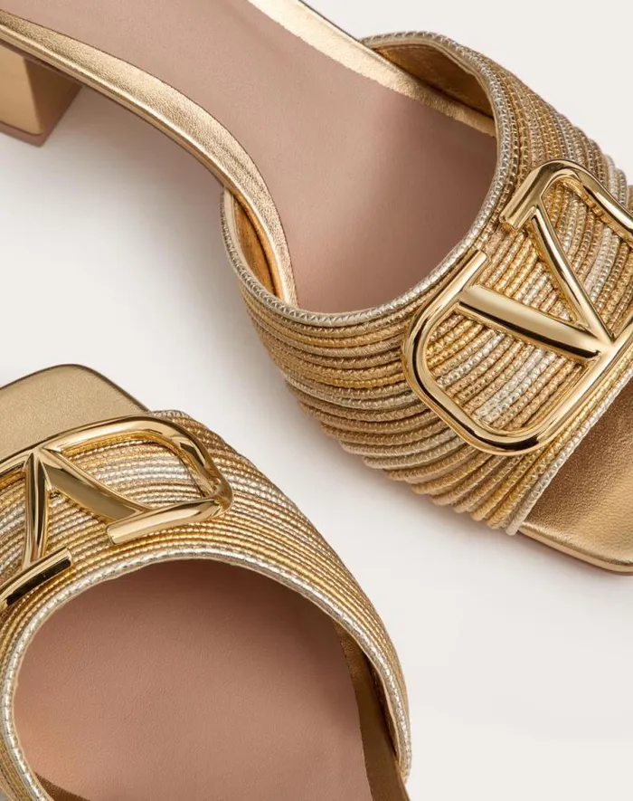 Valentino Sandals Woman Metallic Vlogo Signature Slide Sandal With Cornely Embroidery 60mm For Woman In Gold Gold Valentino Sandals Woman Metallic Vlogo Signature Slide Sandal With Cornely Embroidery 60mm For Woman In Gold Gold
