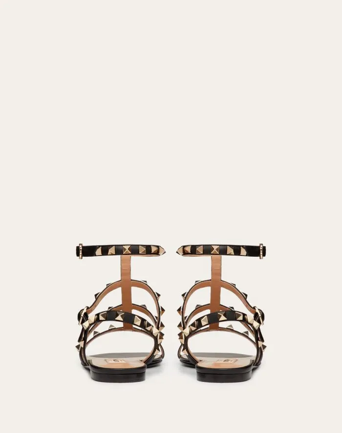 Valentino Sandals Woman Rockstud Flat Calfskin Sandal With Straps For Woman In Almond Almond Valentino Sandals Woman Rockstud Flat Calfskin Sandal With Straps For Woman In Almond Almond