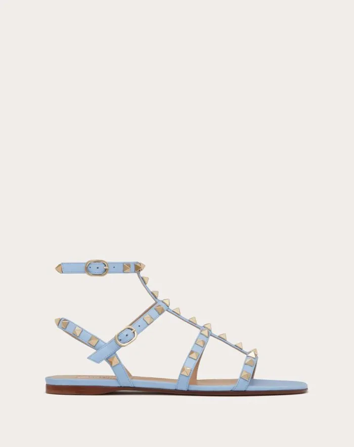Valentino Sandals Woman Rockstud Flat Calfskin Sandal With Straps For Woman In Azure Azure Valentino Sandals Woman Rockstud Flat Calfskin Sandal With Straps For Woman In Azure Azure