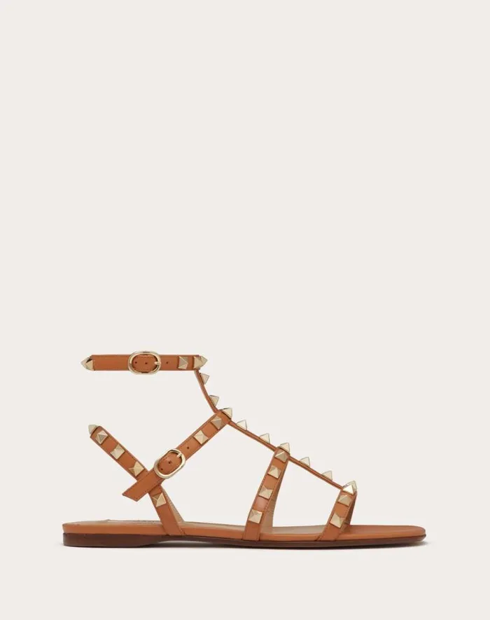 Valentino Sandals Woman Rockstud Flat Calfskin Sandal With Straps For Woman In Azure Azure Valentino Sandals Woman Rockstud Flat Calfskin Sandal With Straps For Woman In Azure Azure