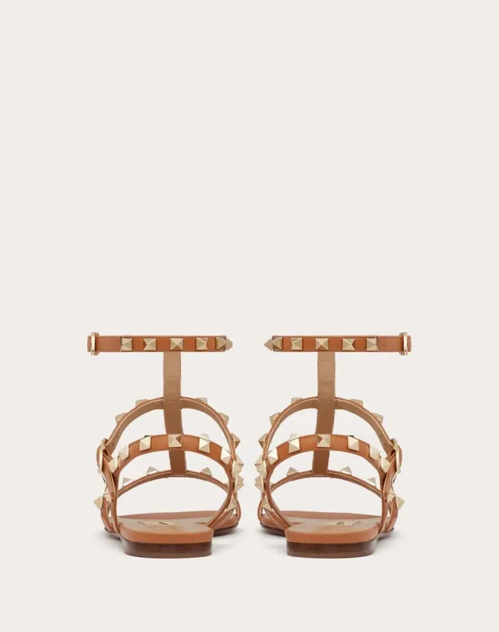 Valentino Sandals Woman Rockstud Flat Calfskin Sandal With Straps For Woman In Azure Azure Valentino Sandals Woman Rockstud Flat Calfskin Sandal With Straps For Woman In Azure Azure