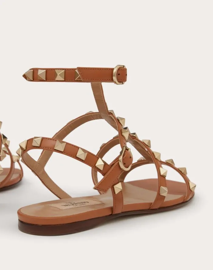 Valentino Sandals Woman Rockstud Flat Calfskin Sandal With Straps For Woman In Azure Azure Valentino Sandals Woman Rockstud Flat Calfskin Sandal With Straps For Woman In Azure Azure