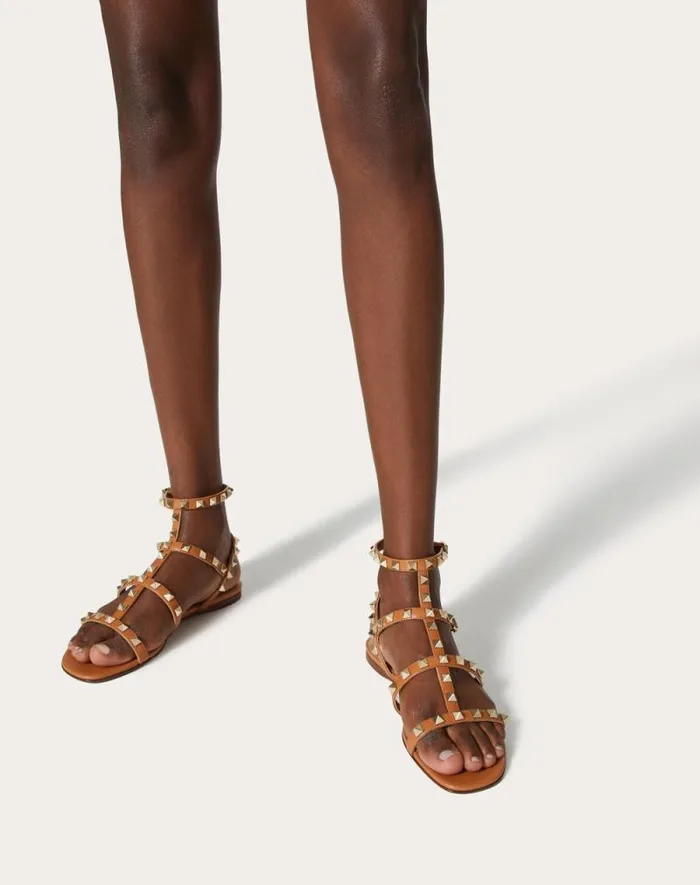 Valentino Sandals Woman Rockstud Flat Calfskin Sandal With Straps For Woman In Azure Azure Valentino Sandals Woman Rockstud Flat Calfskin Sandal With Straps For Woman In Azure Azure