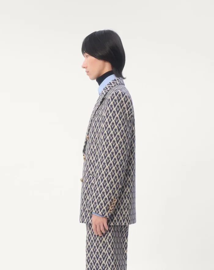 Valentino Suits Man Doublebreasted Wool Jacket With Jacquard Toute La V Pattern For Man In Nightcream Nightcream Valentino Suits Man Doublebreasted Wool Jacket With Jacquard Toute La V Pattern For Man In Nightcream Nightcream