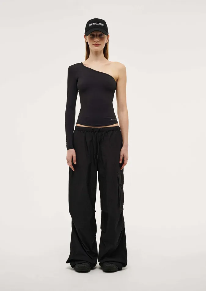 Women FOUNDATION ASYMMETRIC LONG SLEEVE TOP IN BLACK LongSleeveTops PE Nation